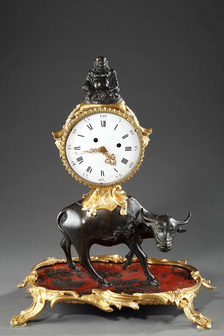 A mid-18th century patinated and ormulu "Chinoiserie"mantel-clock